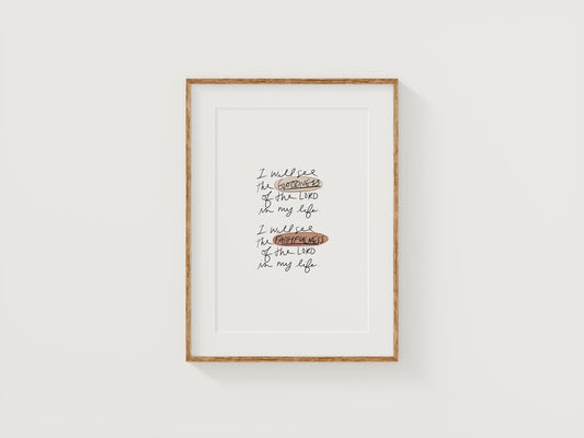 Christian hand-lettered digital wall art that says “I will see the goodness and faithfulness of the Lord” in a natural wood frame.