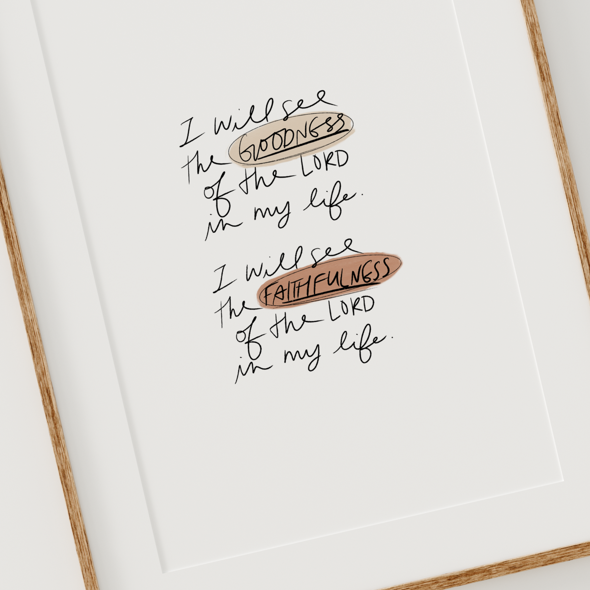 Christian hand-lettered digital wall art that says “I will see the goodness and faithfulness of the Lord” in a natural wood frame.